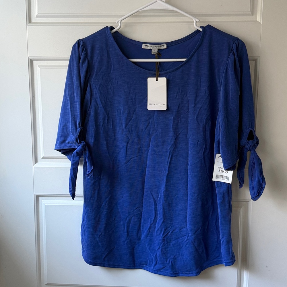 Green Envelope Blue Top